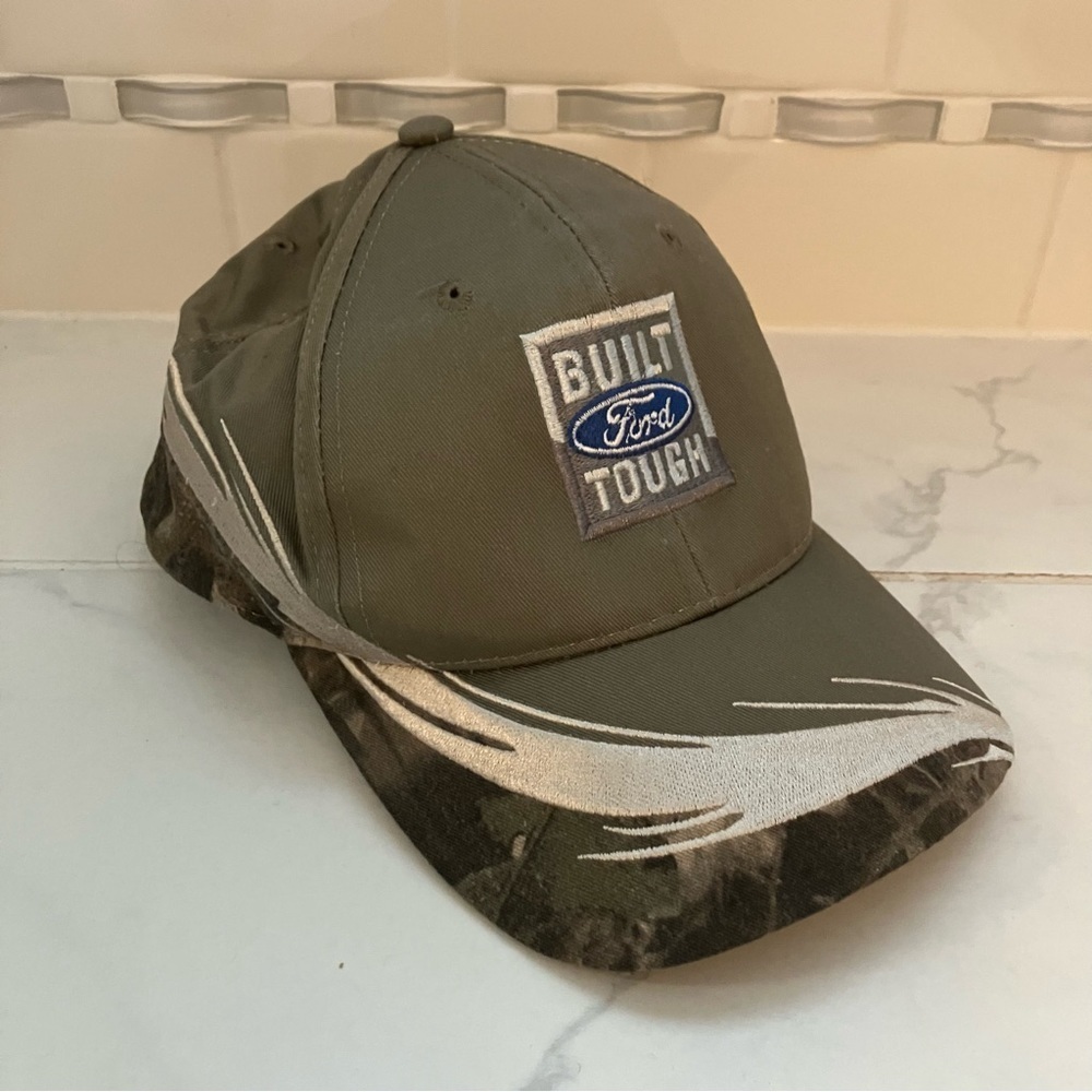 Built ford tough grey / blue adjustable strap baseball hat.